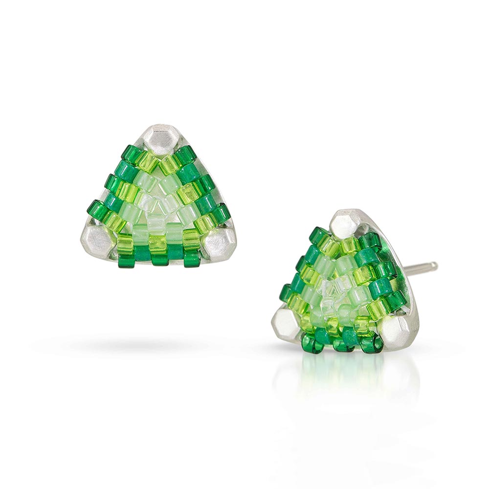 Signature collection beaded studs that are sterling silver/hand-stitched glass beads that come in kelly green