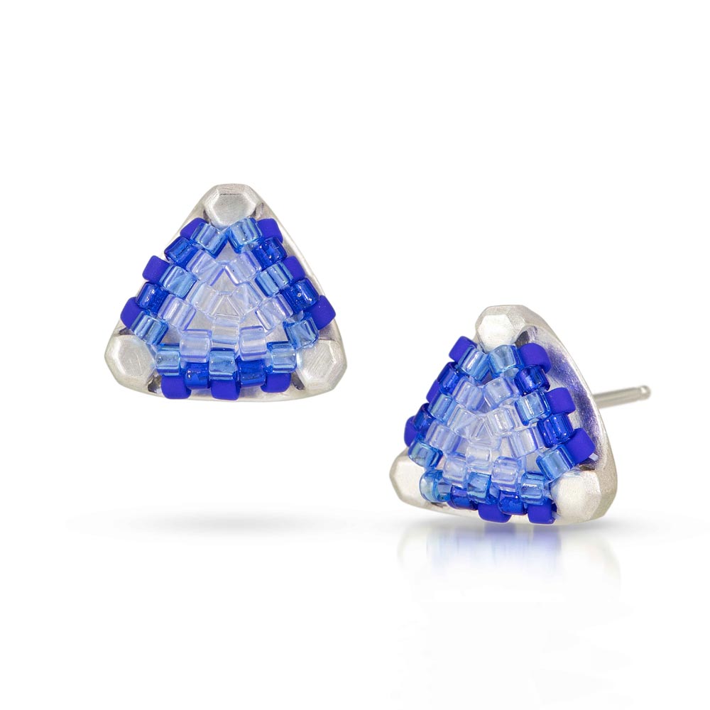Signature collection beaded studs that are sterling silver/hand-stitched glass beads that come in cobalt blue