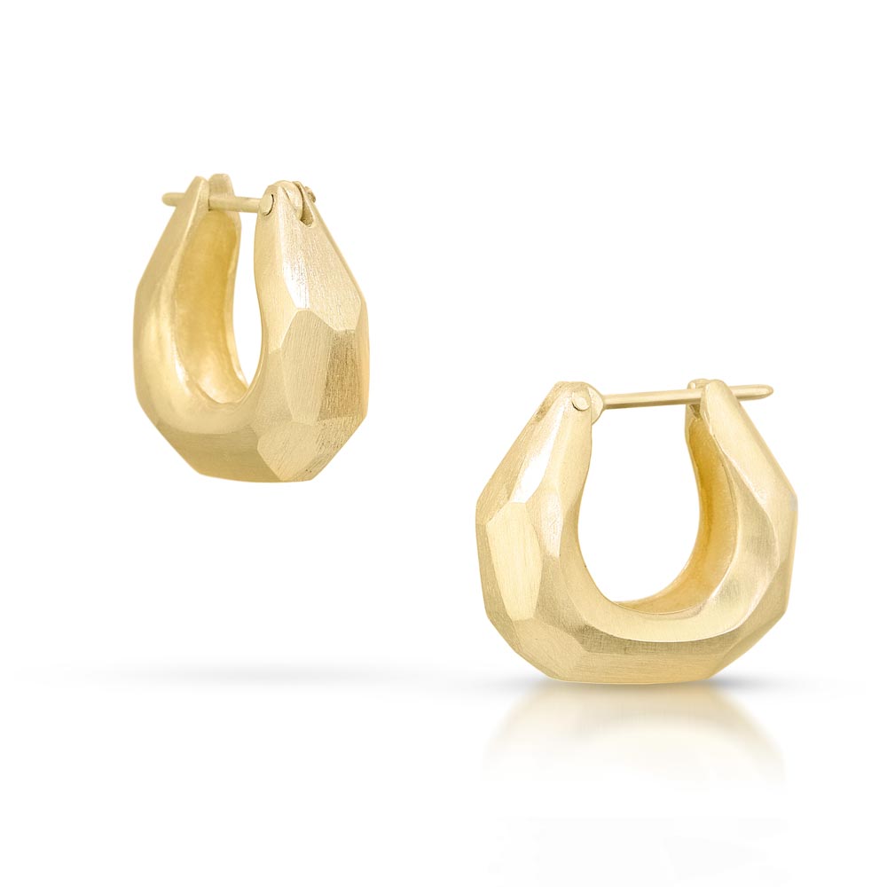 Sculpt collection hoop earrings that are gold.